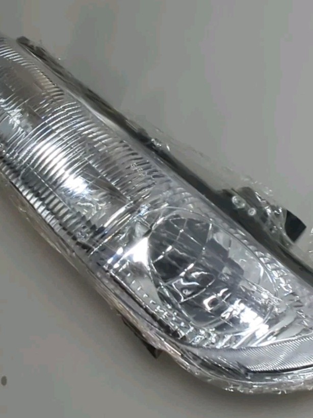 TYC 20-5058-00 Replacement Headlight For Saturn Phillips Bulbs Driver Side Left
