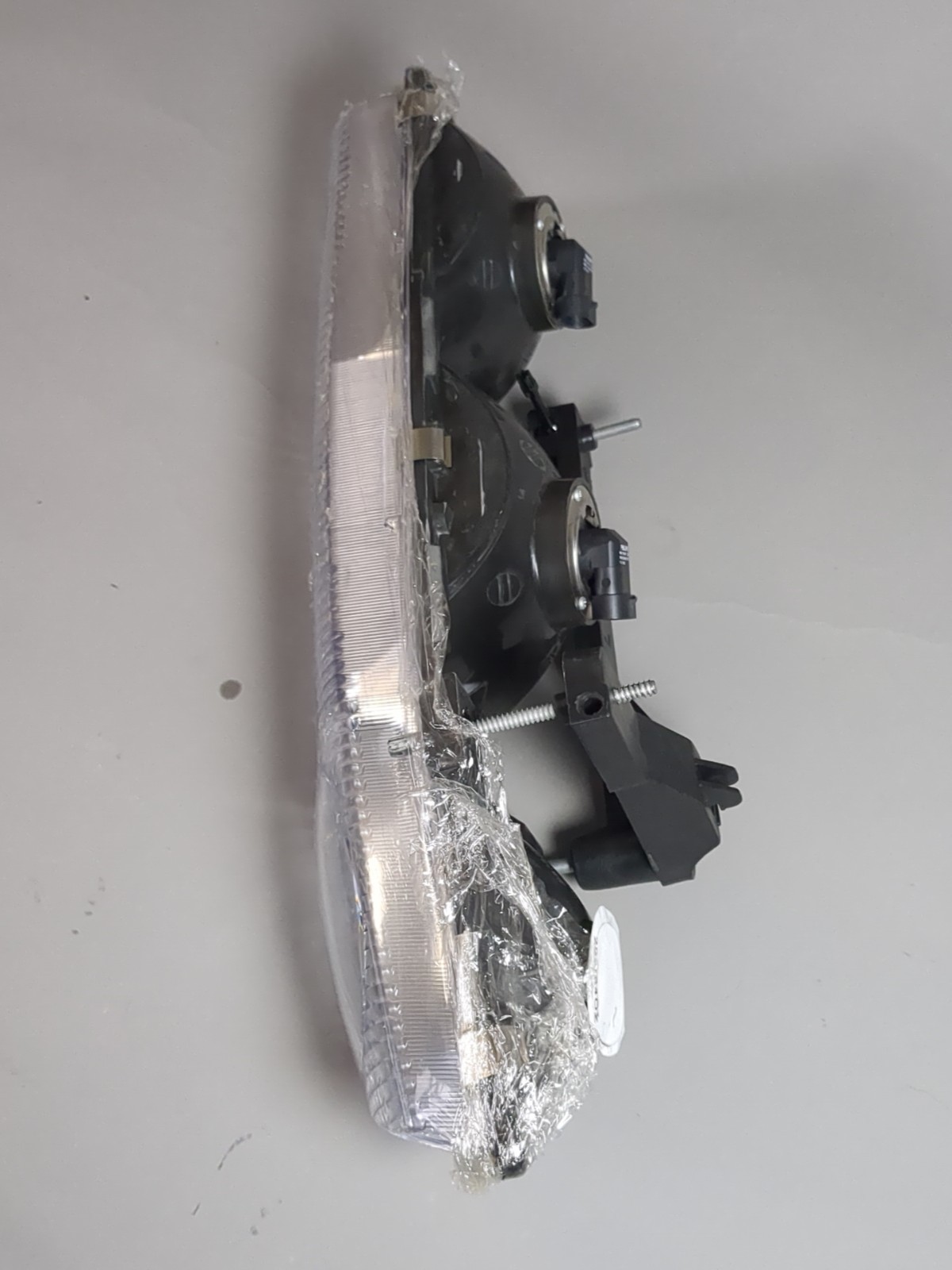 TYC 20-5058-00 Replacement Headlight For Saturn Phillips Bulbs Driver Side Left