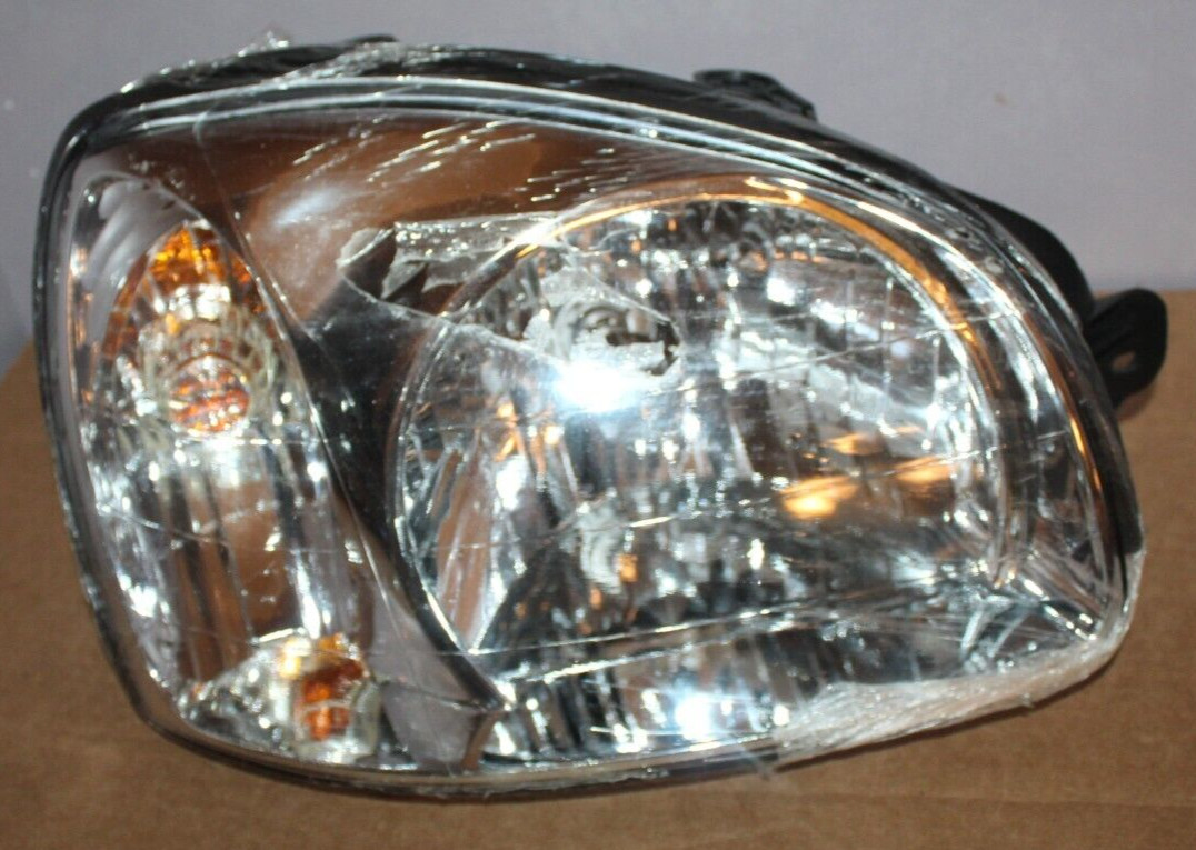 TYC 20-6401-80 Headlight Assembly For 03-06 Hyundai Santa Fe