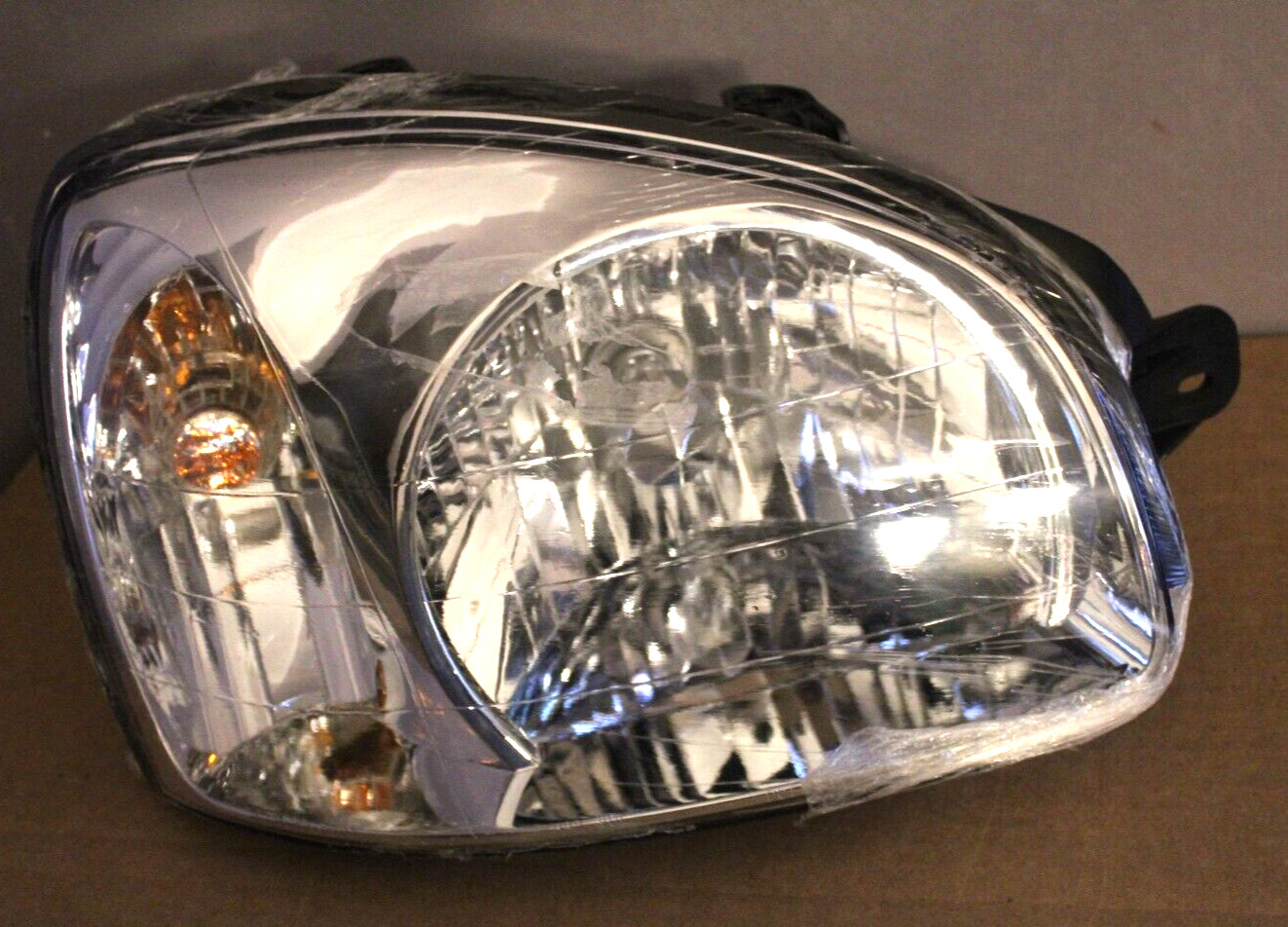 TYC 20-6401-80 Headlight Assembly For 03-06 Hyundai Santa Fe